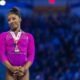 Simone Biles seals Paris Olympics qualification with stunning floor routine… as NFL husband Jonathan Owens leads standing ovation