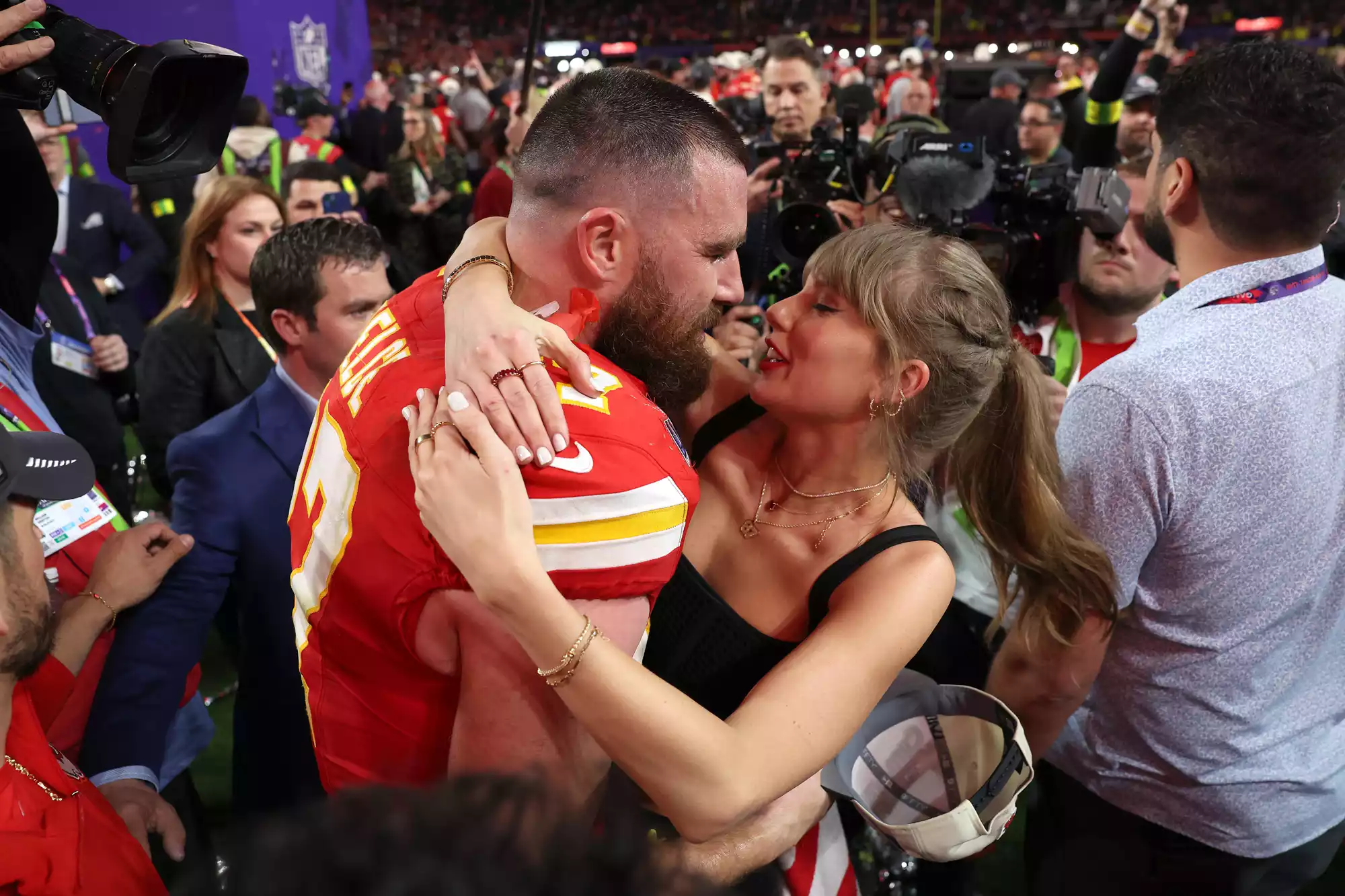 Taylor Swift Gets a Sweet Kiss from Travis Kelce as He Attends Her Eras Tour Stop in Amsterdam