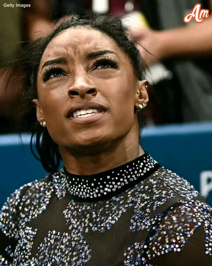 CAN SOMEONE FIX HER HAIR FOR HER PLEASE?!’: Olympics viewers slammed Simone Biles for her hairdo at the competition, but she did THIS HISTORIC THING before their eyes. Details and photos are in the comments below.