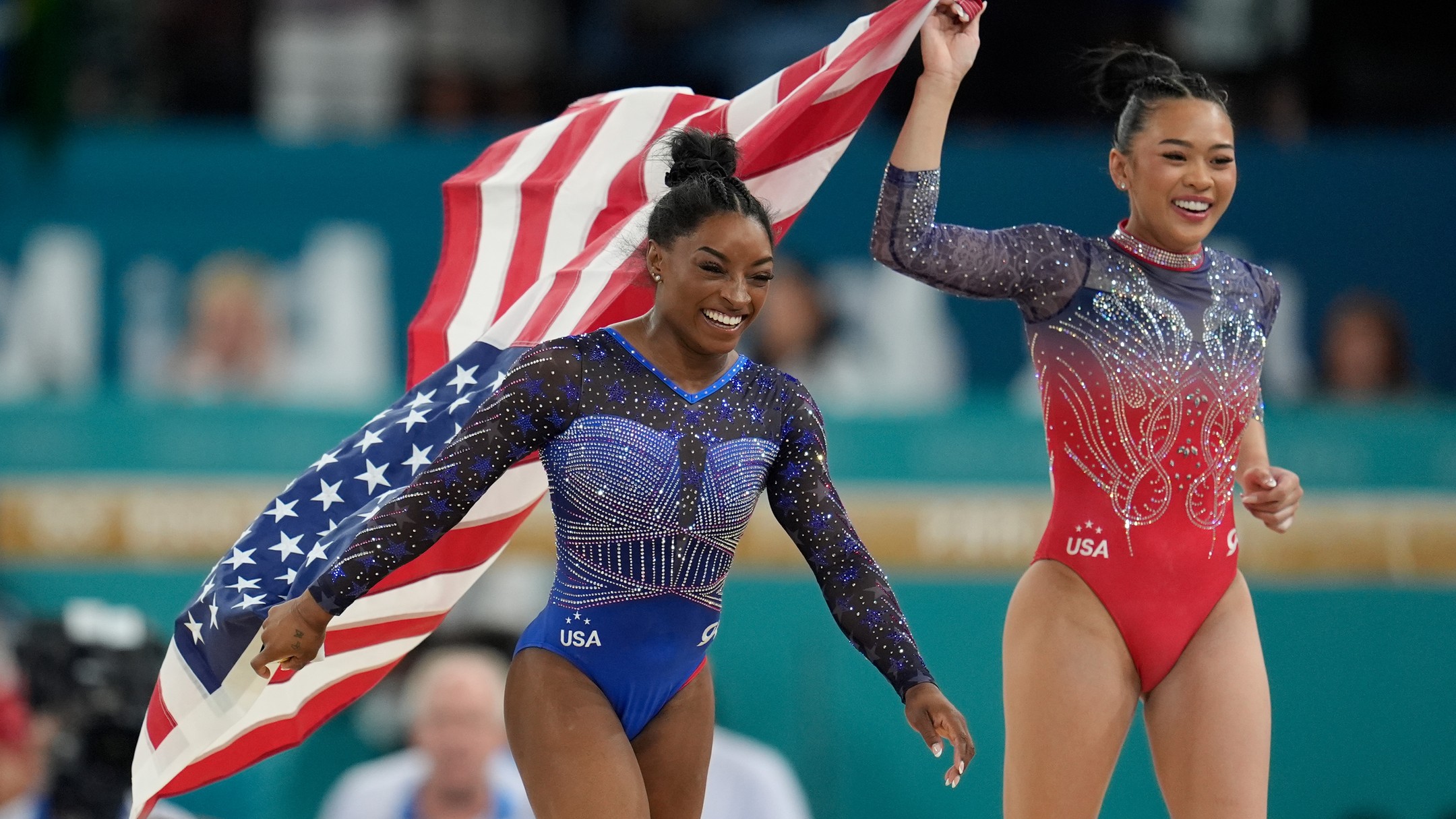 As soon as Suni completed her floor routine and she was guaranteed to win a medal, Simone embraced her and said, "I'm so proud of you." In the end, Suni pulled through for a bronze medal with a total score of 56.465! Rebeca (Brazil) earned a total score of 57.932 to win silver, and Simone (USA) earned a total score of 59.131 to win gold. With these wins, Suni and Simone also make history as the first U.S. Olympic gymnasts to own multiple all-around medals, according to USA Gymnastics and Team USA. Congrats to all who competed today. What a competition!