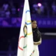 Simone Biles Carries the Olympic Flag During Paris Closing Ceremony as Olympics Transition to Los Angeles ...Full Details Bellow