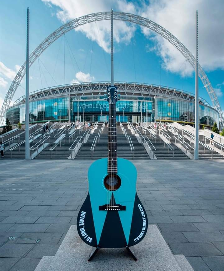 Wembley Stadium Gifts Taylor Swift Custom Guitar to Celebrate Eras Tour Achievement..Read More