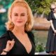 Nicole Kidman cuts a glamorous figure in plunging black midi dress as she promotes her erotic thriller Babygirl at Venice Film Festival - after admitting she's not 'brave enough' to watch it