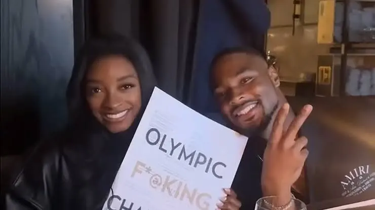 Simone Biles Poses with ‘Olympic F–king Champion’ Menu During Dinner with Jonathan Owens ; See Here ..