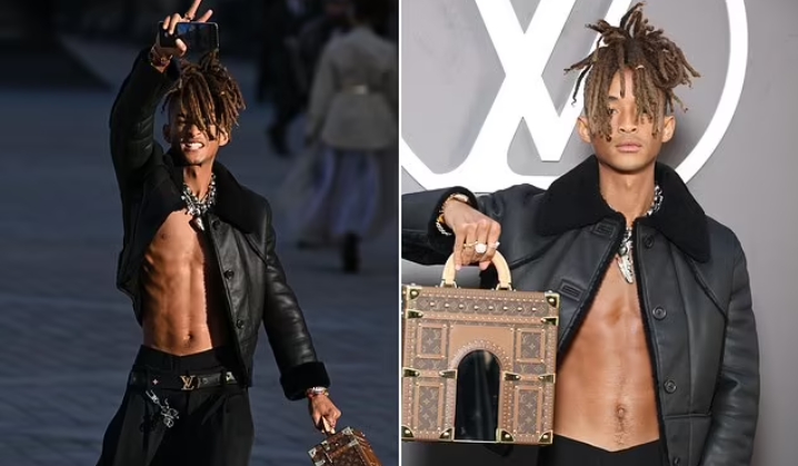 Jaden Smith showcases his rock hard abs as he goes shirtless beneath a leather jacket while putting on an animated display at Louis Vuitton show during Paris Fashion Week