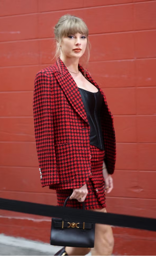 Taylor Swift Wears Red Skirt Suit With Black Corset to Travis Kelce's Game Against the Broncos