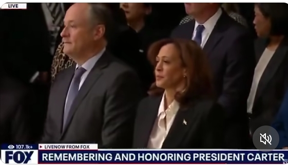 President Kamala Harris arrives with the First Gentleman at the Capitol rotunda to greet former President Jimmy Carter's casket along with MAGA Mike Johnson.